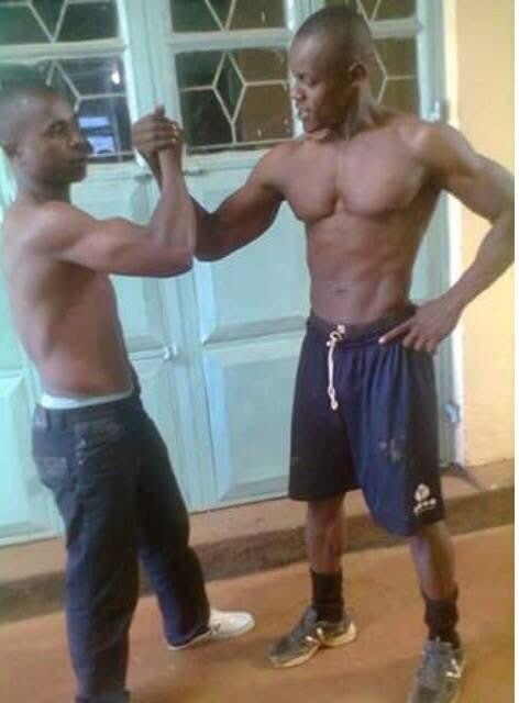 Physique pose with training partner